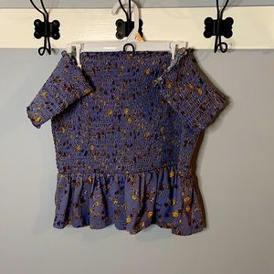 Off the shoulder cropped blouse.